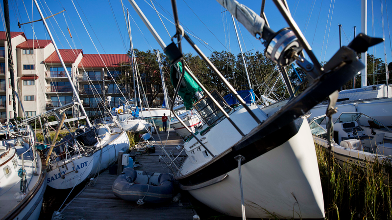 Boats sit pushed up amongst the twisted docks at Palmetto Bay Marina damaged by Hurricane Matthew in Hilton Head, S.C., Sunday, Oct. 9, 2016. (Image: AP)